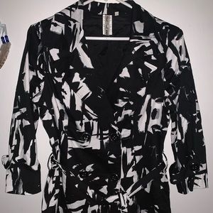 A black and white trench coat.